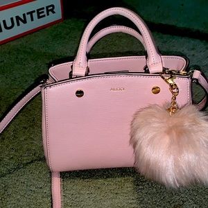 Brand new Aldo purse pink with fluffy ball